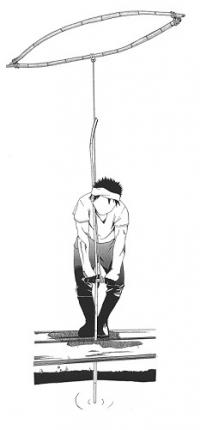 竹ヒゴに「シュモク」というにぎる部分をつけて掘っているところ。うえにあるのも竹で、バネのはたらきで掘るのをたすける。